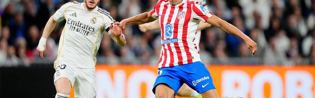 维尼修斯梅开二度助皇马10人逆转马竞 5连胜紧追西甲榜首